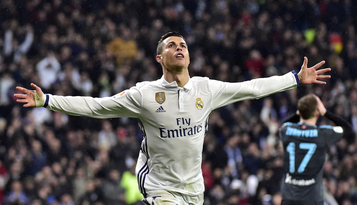 Cristiano Ronaldo merupakan pencetak gol terbanyak sepanjang massa Real Madrid. Ia berhasil persembahkan 450 gol dan 132 assist dari 437 penampilan di semua kompetisi. Torehannya terhenti sejak 2018 lalu ketika dirinya memutuskan hengkang ke Juventus. (Foto: AFP/Gerrard Julien)