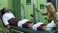 10 siswa SD Negeri 1 Sriwungu, Kecamatan Banyumas, Kabupaten Pringsewu, Lampung mengalami keracunan usai mengonsumsi jajanan ringan. (Dok. Istimewa).