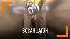Seorang bocah laki-laki berusia 2 tahun jatuh ke lubang sedalam 21 meter. Beruntung ia berhasil diselamatkan tanpa luka papun.
