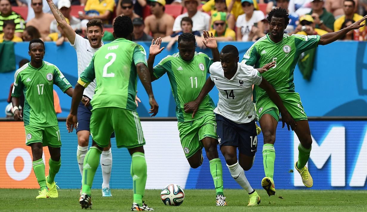 Nigeria. Nigeria telah lolos sebanyak 6 kali ke putaran final Piala Dunia, yaitu edisi 1994 hingga 2002 dan 2010 hingga 2018. Mereka mampu 3 kali lolos dari fase grup, yaitu di Piala Dunia 1994, 1998 dan 2014, ketiganya terhenti di babak kedua (16 besar). Pada edisi 2014, Nigeria tersingkir di babak 16 besar usai kalah 0-2 dari Prancis. (AFP/Jewel Samad)