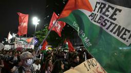 Berbagai aksi peringatan digelar di berbagai negara sejak Senin (7/10/2024) untuk memperingati satu tahun serangan Israel di Gaza. (NELSON ALMEIDA/AFP)
