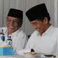 Foto kenangan KH Hasyim Muzadi dan Presiden Jokowi. (Liputan6.com/Herman Zakharia)