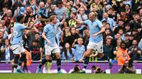 Manchester City meraih kemenangan 2-1 atas Brentford pada laga pekan keempat Premier League musim ini di Stadion Etihad, Sabtu (14/9/2024) malam WIB. (AFP/Oli Scarff)