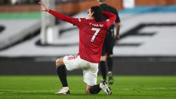 Selebrasi tersebut sejatinya sudah dilakukan Cavani sejak masih membela Paris Saint-Germain. (Foto: AFP/Pool/Clive Rose)