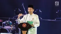 Presiden Joko Widodo memberikan paparan saat menghadiri konsolidasi calon legislatif Partai Kebangkitan Bangsa (PKB) Pemilu 2019 sekaligus haul Abdurrahman Wahid, Gus Dur di Balai Sarbini, Jakarta, Senin (17/12). (Liputan6.com/Faizal Fanani)