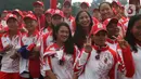 Sejumlah atlet perempuan berpose saat pelepasan Kontingen Indonesia untuk SEA Games 2019 Filipina di Istana Bogor, Jawa Barat, Rabu (27/11/2019). Sebanyak 841 atlet Indonesia akan berlaga di 52 cabang olahraga pada ajang multievent olahraga terbesar se-Asia Tenggara. (Liputan6.com/Angga Yuniar)
