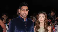 Petinju Amir Khan menyebut sang istri, Faryal Makhdoom, telah berselingkuh dengan Anthony Joshua. (BBC)
