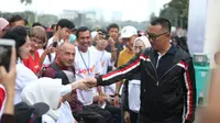 Menpora Imam Nahrawi mewakili Presiden RI melepas peserta Funwalk Bersama Kaum Difabel, di Area Car Freeday FX Sudirman, Jakarta, Minggu (8/9).