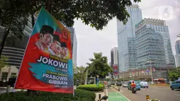 Spanduk atau baliho yang bertuliskan Terima Kasih Jokowi (2014-2024) ini dipasang dan terlihat di sejumlah jalan utama kota Jakarta. (Liputan6.com/Angga Yuniar)