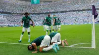 Selebrasi&nbsp;pemain Arab Saudi&nbsp;usai menjebol gawang Argentina di pertandingan Grup C Piala Dunia Qatar 2022&nbsp;yang berlangsung di Stadion Lusail, Doha, Selasa (22/11/2022). (AFP/Odd Andersen)