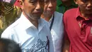 Presiden Joko Widodo usai mendaftarkan Capres-Cawapres ke Komisi Pemilihan Umum (KPU), Jakarta, Jumat (10/8).  Jokowi dan Ma'ruf Amin resmi sebagai capres-cawapres untuk Pilpres 2019. (Merdeka.com/Imam Buhori)