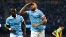 Selebrasi Nicolas Otamendi setelah mencetak gol pertama Manchester City ke gawang Norwich City dalam laga Liga Premier Inggris di Stadion Etihad, Manchester, Sabtu (31/10/2015) malam WIB. (AFP Photo/Lindsey Parnaby)