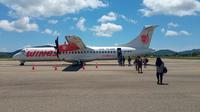 Foto : Pesawat Wings Air di hanggar Bandara El Tari Kupang (Liputan6.com/Ola Keda)