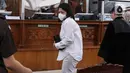 Terdakwa Putri Candrawathi usai menjalani sidang lanjutan dalam kasus pembunuhan Brigadir Yosua Hutabarat dengan agenda sidang pembacaan tuntutan oleh Jaksa Penuntut Umum di Pengadilan Negeri Jakarta Selatan, Rabu (18/1/2023). Putri Candrawathi dituntut 8 tahun Penjara. (Liputan6.com/Johan Tallo)