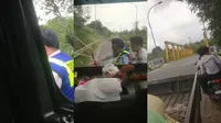 Dua pria mengenakan baju Dinas Perhubungan (Dishub) Lampung Tengah diduga melakukan pungli. Foto : (Istimewa).