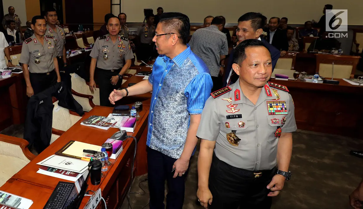 Kapolri Jenderal Pol Tito Karnavian usai mengikuti rapat kerja dengan Komisi III DPR di Kompleks Parlemen Senayan, Jakarta, Rabu (14/3). Rapat membahas persiapan Polri dalam pengamanan Pilkada Serentak 2018. (Liputan6.com/Johan Tallo)
