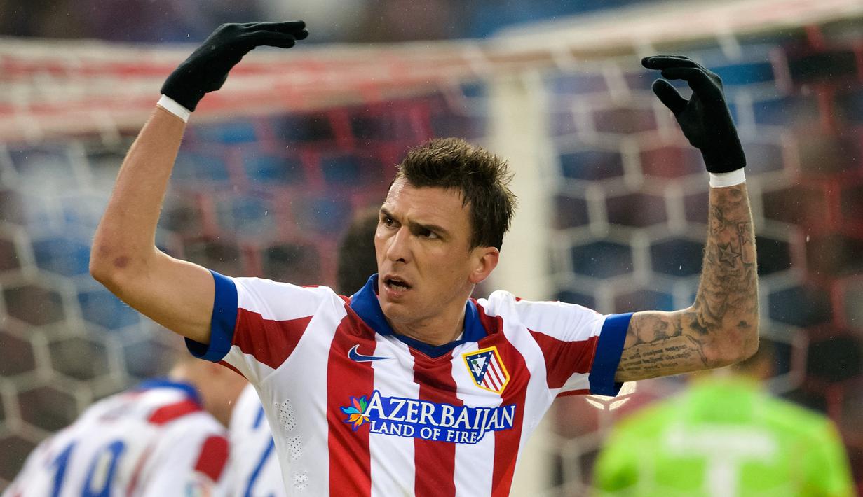Atletico Madrid. Pada awal musim 2014/2015 Mario Mandzukic hijrah ke Atletico Madrid. Total satu musim, ia tampil dalam 43 laga bersama Los Rojiblancos dengan mencetak 20 gol dan mempersembahkan trofi Super Copa Spanyol tahun 2014.(Foto: AFP/Dani Pozo)