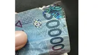 Viral Aksi Perempuan Merobek Uang Kertas Rupiah Akibat Kesal, Awas Kena Denda Rp 1 Miliar