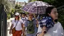 Kementerian Kebudayaan telah memutuskan untuk menutup situs arkeologi selama jam-jam terpanas hari itu, dari siang hingga jam 5 sore, karena Yunani dilanda gelombang panas. (AFP/Spyros Bakalis)