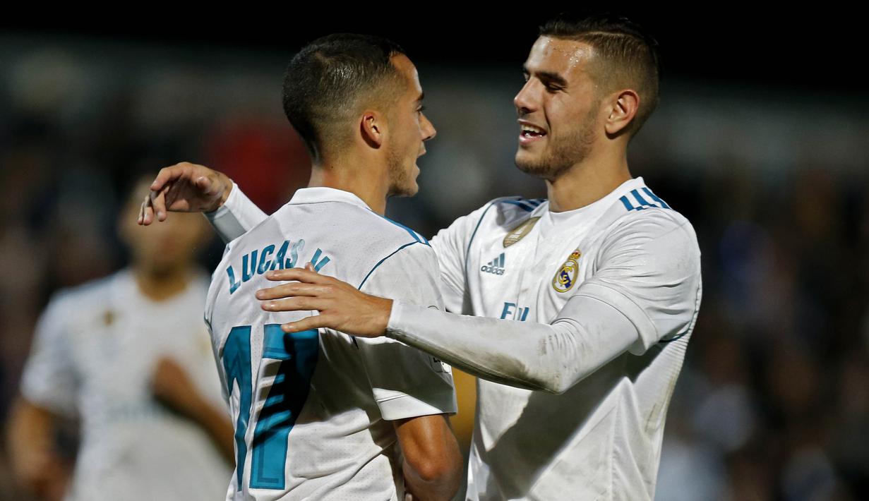 Pemain Real Madrid, Theo Hernandez, merayakan gol yang dicetak Lucas Vazquez ke gawang Fuenlabrada pada laga Copa del Rey di Stadion Fernando Torres, Madrid, Kamis (26/10/2017). Fuenlabrada kalah 0-2 dari Madrid. (AP/Francisco Seco)