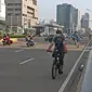 Aktivitas warga di kawasan MH Tharim, Minggu (15/3/2020). Hari bebas kendaraan bermotor (HBKB) atau car free day (CFD) di sepanjang Jalan MH Thamrin dan Jalan Jenderal Sudirman akan ditiadakan selama dua pekan atau pada 15 Maret dan 22 Maret 2020. (Liputan6.com/Herman Zakharia)