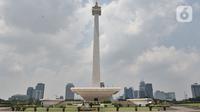Suasana kawasan Monumen Nasional (Monas) yang ditutup, Jakarta, Minggu (15/3/2020). Gubernur Anies Baswedan menutup tempat wisata di DKI Jakarta seperti Monas, Ragunan, dan museum yang dikelola Pemprov DKI selama dua pekan ke depan guna mencegah penyebaran Covid-19. (merdeka.com/Iqbal S. Nugroho)