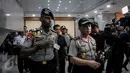 Kapolri Jendral Tito Karnavian saat tiba di kantor Kementerian Perhubungan, Jakarta, Selasa (11/10). Polda Metro Jaya menggelar operasi tangkap tangan (OTT) di Kantor Kemenhub terkait praktek pungli perizinan kapal. (Liputan6.com/Faizal Fanani)