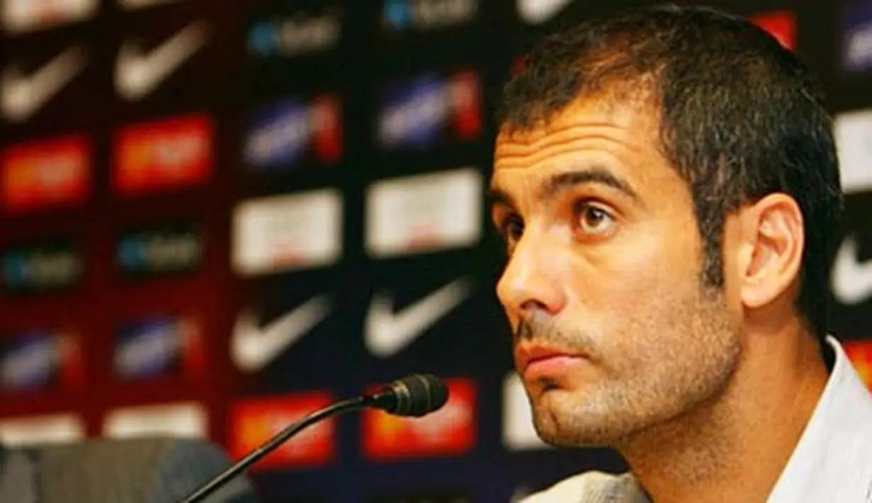 Coach of the Barcelona football team Josep Guardiola attend a press conference to explain the dispute over Lionel Messi and his participation in the Olympic Games in Beijing on August 7, 2008 in Barcelona. AFP PHOTO/JOSEP LAGO.