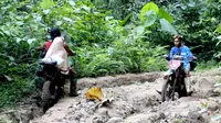 Kondisi Jalan menuju Kecamatan Pinogu, Kabupaten Bone Bolango, Gorontalo yang memprihatinkan (Arfandi Ibrahim/Liputan6.com)