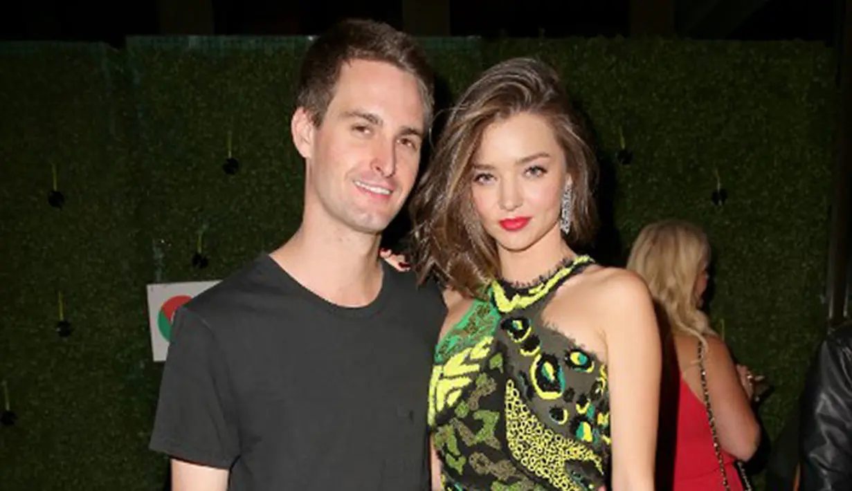 Resmi menjadi sepasang suami istri, kini Miranda Kerr dan Evan Spiegel menikmati waktu bersama untuk berbulan madu. Lalu bagaimana dengan Flynn Bloom, anak Miranda dan Orlando Bloom di pernikahan mereka sebelumya. (AFP/Bintang.com)