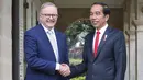 <p>"Kunjungan saya ke Australia kali ini akan fokus pada penguatan kerja sama ekonomi, di mana Anda semua akan jadi bagian penting di dalamnya," kata Jokowi, demikian dikutip dari keterangan Biro Pers Sekretariat Presiden RI yang diterima di Jakarta. (Lisa Maree Williams/Pool via AP)</p>
