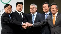 Delegasi olimpiade dari Korea Utara dan Selatan bersama International Olympic Committee (IOC) President Thomas Bach usai sepakati keikutsertaan Korut di Olimpiade Musim Dingin Korsel (FABRICE COFFRINI / AFP)