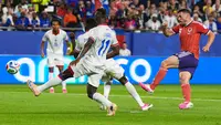 John McGinn mencetak gol di laga Haiti vs Skotlandia di laga matchday 1 Grup C Piala Dunia 2026 di Boston Stadium, Foxborough, Massachusetts, Minggu (14/6/2026) pagi WIB. (AP Photo/Martin Meissner)