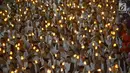 Umat muslim mengikuti pawai obor menyambut Tahun Baru Islam 1441 H pada acara Jakarta Muharram Festival di kawasan Bundaran HI, Jakarta, Sabtu (31/8/2019). Pawai yang diikuti 4000 peserta dimulai dari Jalan Merdeka Barat, Silang Monas, menuju Bundaran HI. (merdeka.com/Imam Bukhori)