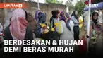 Diguyur Hujan, Emak-emak Rela Berdesakan Untuk Beli Beras Murah