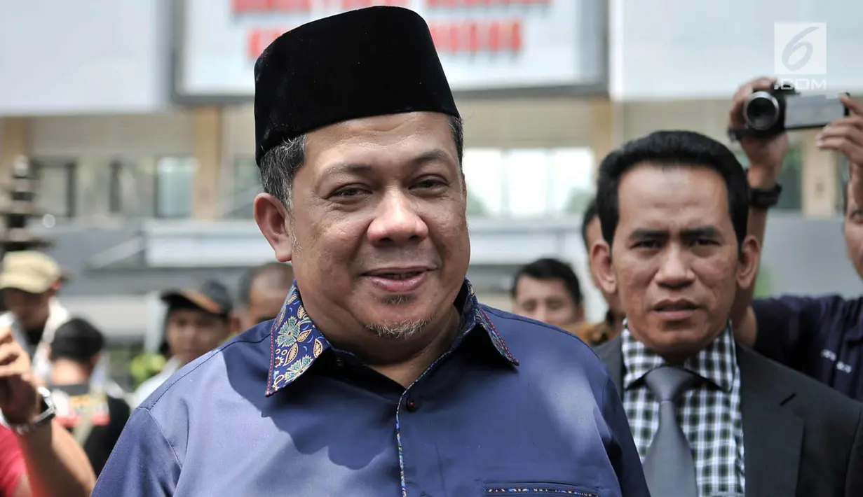 Wakil Ketua DPR RI Fahri Hamzah usai memenuhi panggilan di Mapolda Metro Jaya, Jakarta, Senin (19/3). Fahri menyatakan Sohibul Iman melakukan penyerangan di depan umum dengan menyebut dirinya pembohong dan pembangkang. (Merdeka.com/Iqbal S. Nugroho)