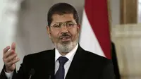 Eks presiden Mesir, Mohammed Morsi, meninggal dunia secara mendadak di ruang sidang pada Senin 17 Juni 2019 (AP Photo)