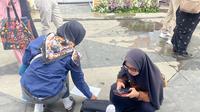 Salah satu pencari kerja di Jakarta Jobfest pada Selasa (19/8/2025) di Velodrome, Rawamangun, Jakarta Timur. (Liputan6.com/Winda Nelfira)