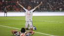 Pemain Arema FC, Betinho melakukan selebrasi usai meraih pertandingan Persija Jakarta vs Arema FC BRI Super League pekan ke-20 yang berlangsung di Stadion Utama Gelora Bung Karno, Minggu (8/2/2026) malam WIB. (Bola.com/Abdul Aziz)