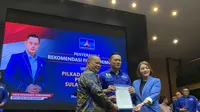 DPP Partai Demokrat resmi memberikan surat rekomendasi pada Elly Engelbert Lasut dan Michaela Elsiana Paruntu, untuk maju Pilkada Sulawesi Utara 2024. (Liputan6.com/Delvira Hutabarat).