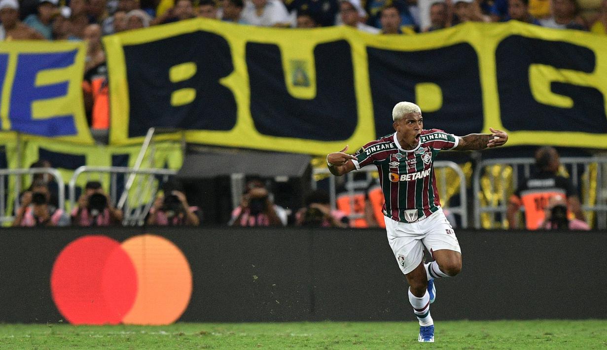 Pemain Fluminense, John Kennedy melakukan selebrasi setelah mencetak gol kemenangan timnya ke gawang Boca Juniors pada final Copa Libertadores yang berlangsung di Maracana Stadium , Rio de Janeiro, Brasil, 5 November 2023 WIB. (AFP/Carl De Souza)