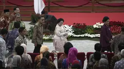 Megawati Soekarno Putri (kedua kanan) bersama Mantan Wakil Presiden Budiono hadiri peringatan lahirnya Pancasila di Gedung Merdeka, Bandung, Jawa Barat, Rabu (1/6/2016). (Liputan6.com/Faizal Fanani)