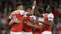 Pemain Arsenal merayakan gol yang dicetak oleh Pierre-Emerick Aubameyang ke gawang Vorskla pada laga Liga Europa di Stadion Emirates, London, Kamis (20/9/2018). Arsenal menang 4-2 atas Vorskla. (AP/Kirsty Wigglesworth)