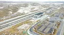 Foto dari udara menunjukkan pemandangan Stasiun Huianbu di Kota Wuzhong, Daerah Otonom Etnis Hui Ningxia, China (14/12/2020). Kereta cepat Yinchuan-Xi'an dan sejumlah stasiun di sepanjang jalurnya akan resmi beroperasi dalam waktu dekat. (Xinhua/Feng Kaihua)