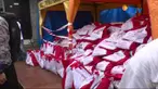 Lewat satu hari, warga ucapkan selamat ulang tahun kepada Jokowi saat pembagian sembako.