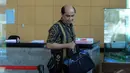 Daniel sudah tiba di Gedung KPK sekitar pukul 09.50 WIB. Namun dia enggan berkomentar banyak mengenai pemeriksaannya itu, Jakarta, Selasa (9/9/2014) (Liputan6.com/Panji Diksana)