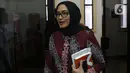 Komisioner KPU RI, Evi Novida Ginting jelang memberi keterangan terkait pernyataan sikap KPU RI terhadap putusan DKPP di Gedung KPU RI, Jakarta, Kamis (19/3/2020). Evi Novida Ginting menyatakan keberatan dan akan mengajukan gugatan atas putusan DKPP. (Liputan6.com/Helmi Fithriansyah)