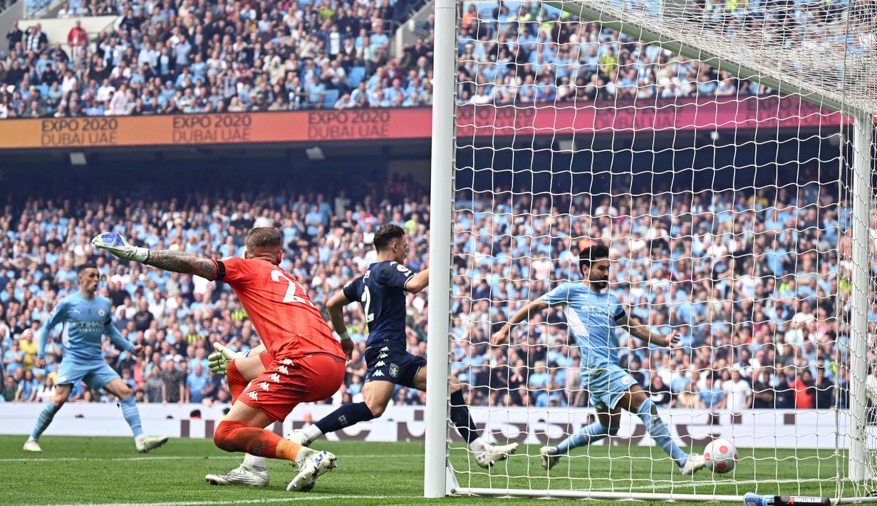 Pemain Manchester City, Ilkay Gundogan, mencetak gol ke gawang Aston Villa. (AFP/Oli Scarff)