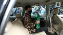 Wahono Saputro selaku Kepala Kantor Pajak Madya Jakarta Timur berada dalam mobilnya usai diperiksa di Gedung Merah Putih KPK, Jakarta Selatan, Selasa (14/3/2023). Perlu diketahui, nama Wahono Saputro ikut terseret dalam kasus ketidakwajaran harta kekayaan mantan Pejabat Direktorat Jenderal Pajak (DJP) Kementerian Keuangan (Kemenkeu), Rafael Alun Trisambodo (RAT). (Liputan6.com/Faizal Fanani)