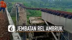 Jembatan peninggalan Belanda itu tak kuat diterjang hujan deras dan arus sungai kencang.